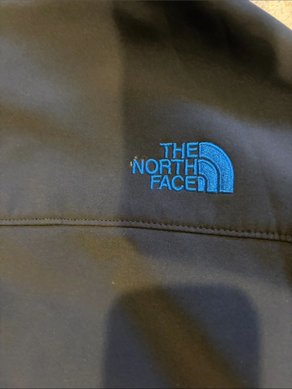 XL The North Face black jacket with blue accents